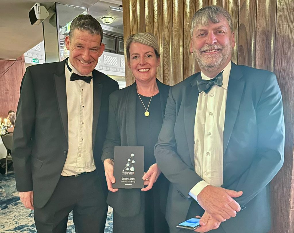 Mike Cleasby, Claire Leake and Mike Ranson bring home the award