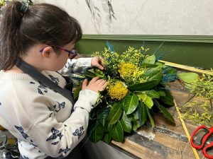 Ellie arranging flowers