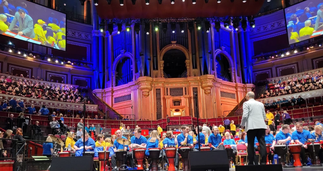 A group of performers on stage at Royal Albert Hall