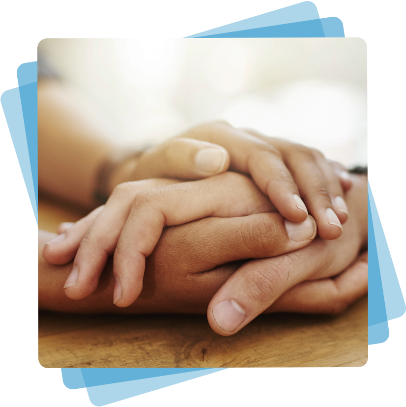 Close up of two people holding hands