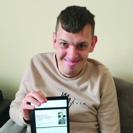 A man holding a tablet
