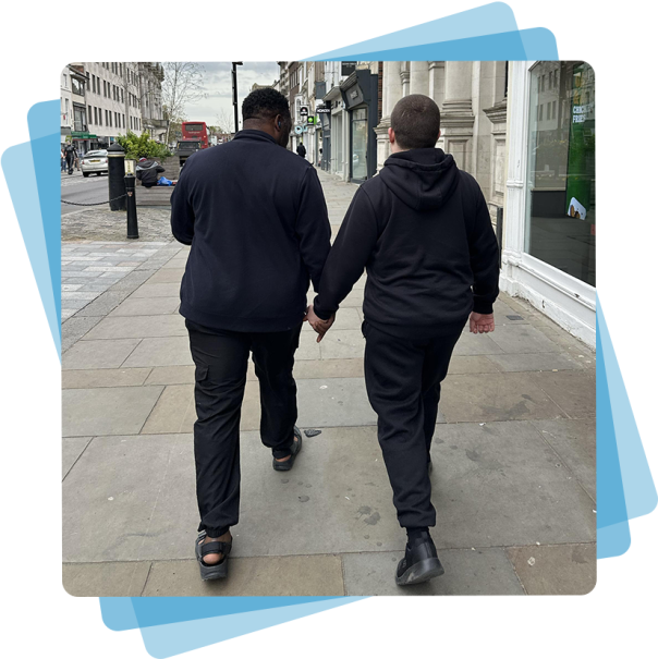 Two men walking down the street